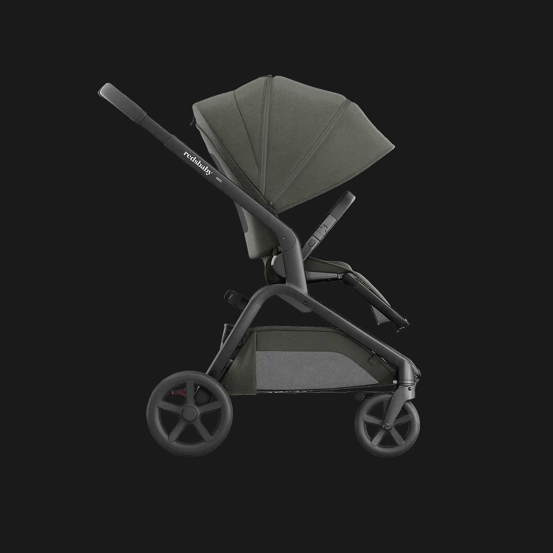 A stroller photographed against a dark background